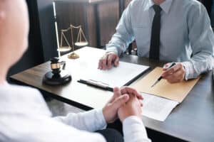 A lawyer explaining negligence and how to prove it to a client